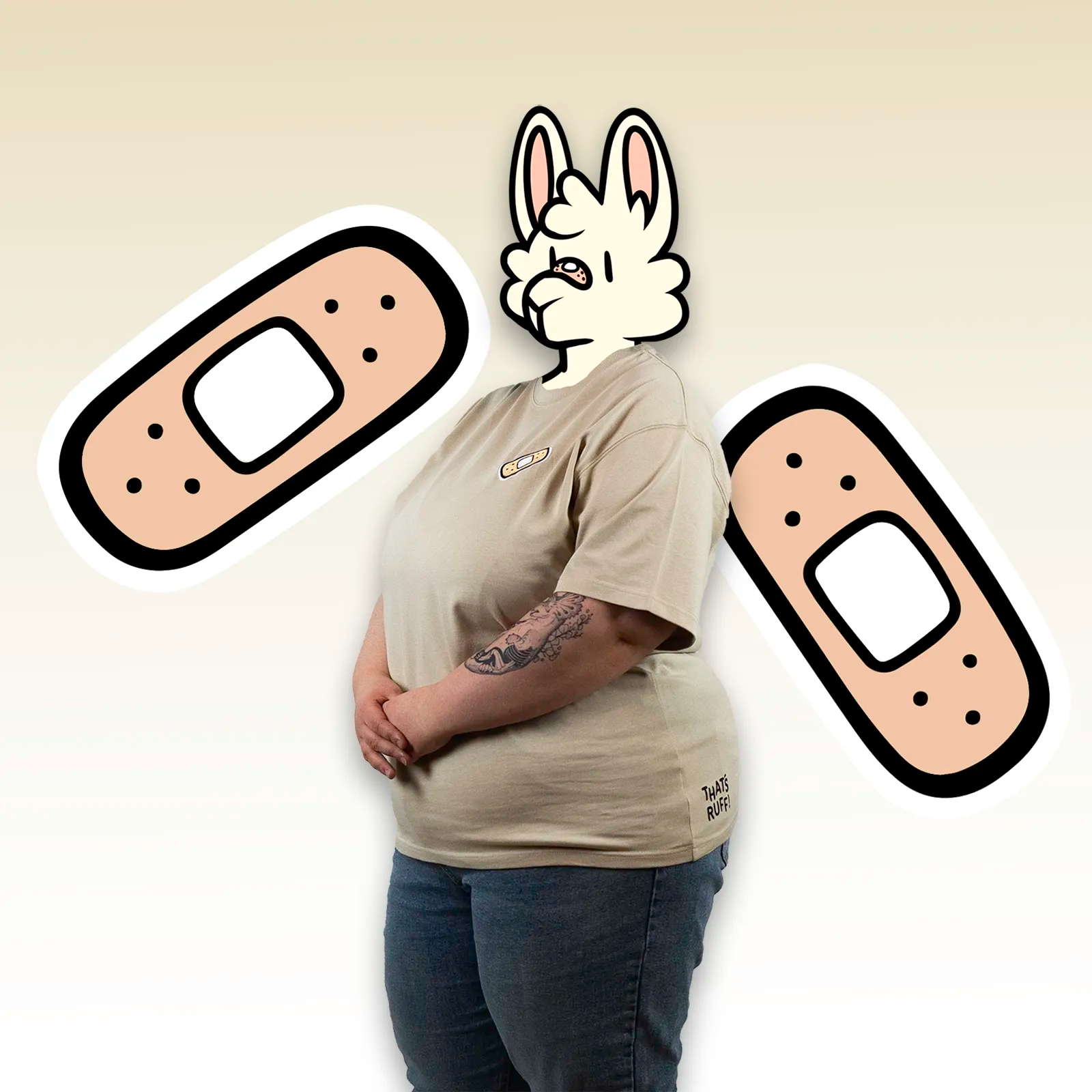 Front view highlighting the tiny bandage chest embroidery on a beige unisex tee—easy everyday top with kawaii vibes.