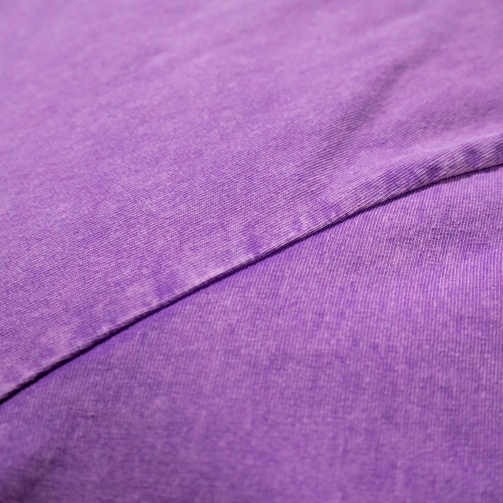 Washed purple 260gsm heavyweight cotton fabric detail from a THAT'S RUFF oversized tee—durable furry streetwear.