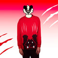 Person wearing a red sweater with a cartoon badger head on a gradient background.