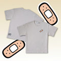 Front and back of a beige unisex t-shirt with small plaster patch embroidery and subtle hem logo—clean minimalist streetwear.