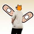 Back angle of a beige premium cotton tee with a small THAT'S RUFF hem mark—clean, minimalist streetwear.