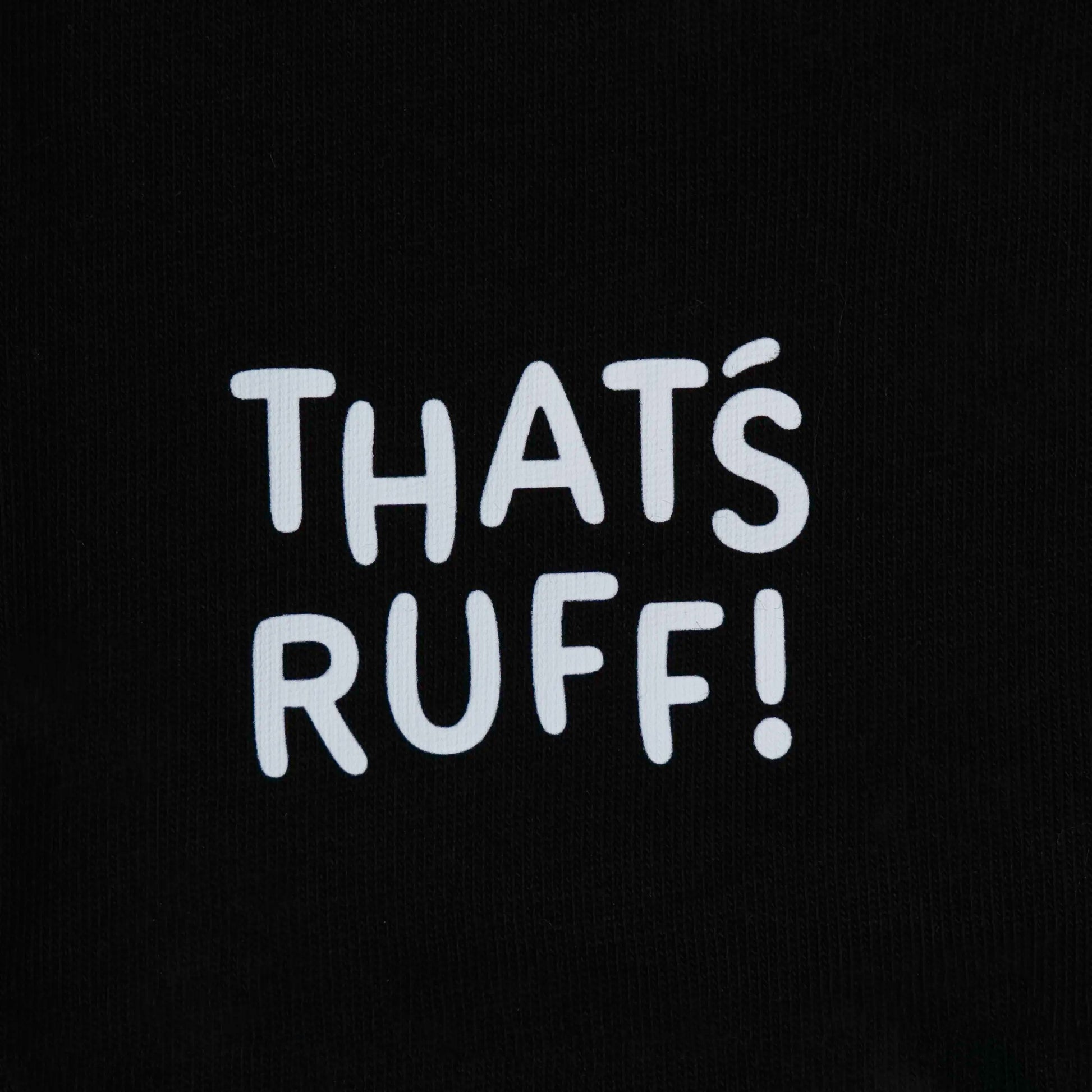 THAT'S RUFF logo printed near the hem on a black tee—discreet branding that’s easy to style.