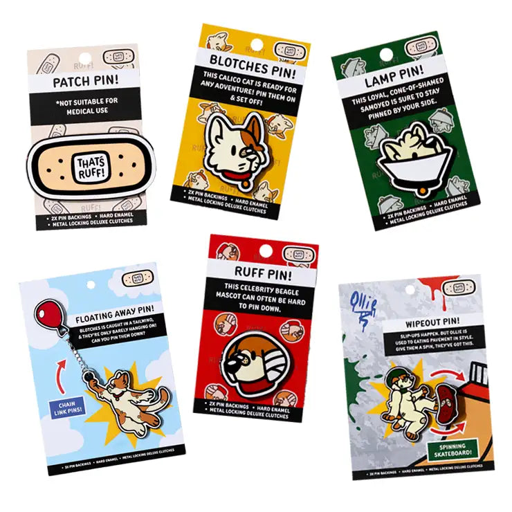 Hard-enamel character pin badges on branded cards with secure metal locking clutches.