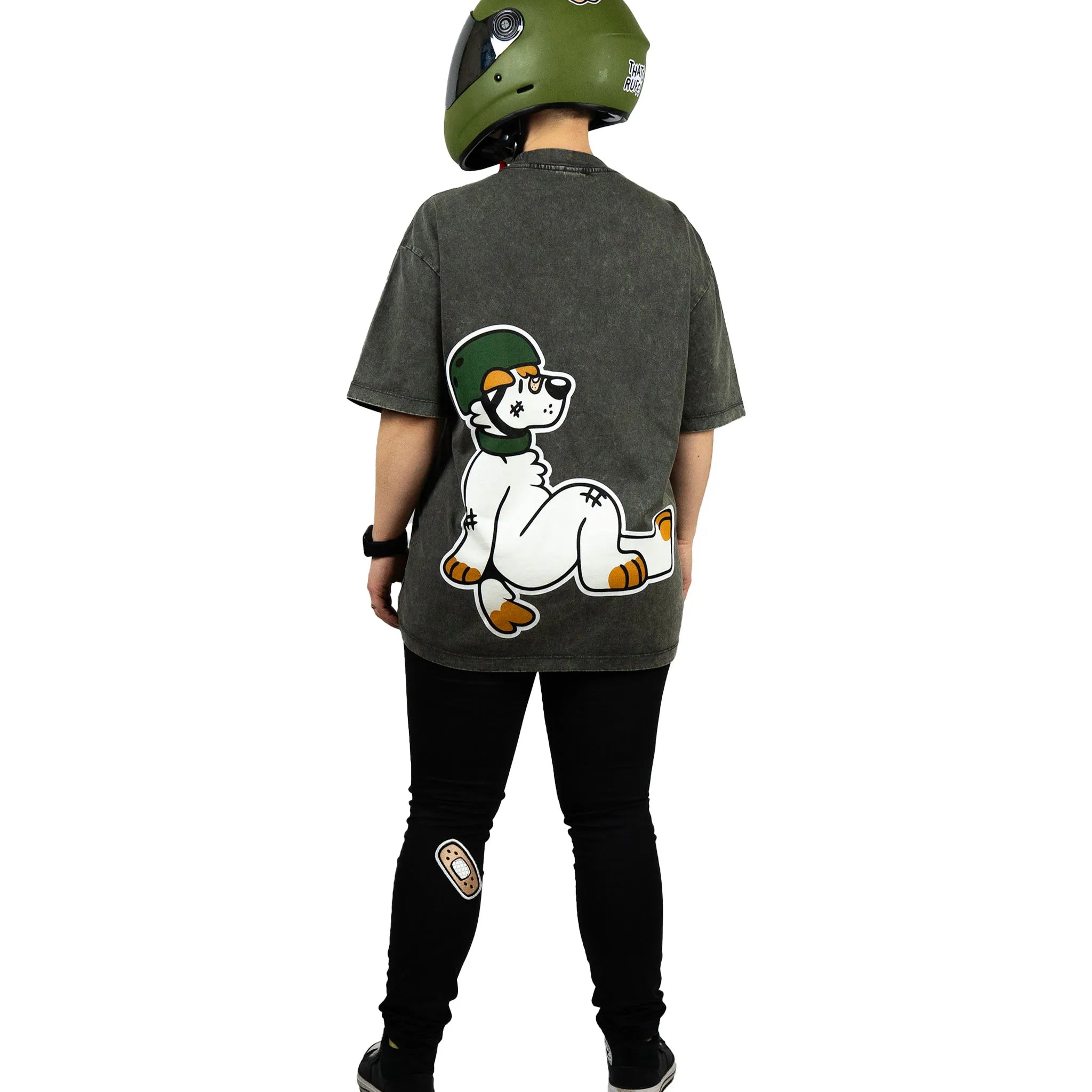 Perfect for furry enthusiasts and fans of playful streetwear, this gray t-shirt from That's Ruff! features a bold graphic of an anthropomorphic dog rocking a helmet. Tailored for comfort and style, it's paired with black pants accented by That's Ruff! patches for a complete look. Whether you're part of the furry fandom or just love standout designs, this shirt delivers rugged charm and individuality. Add a touch of whimsy to your wardrobe today!