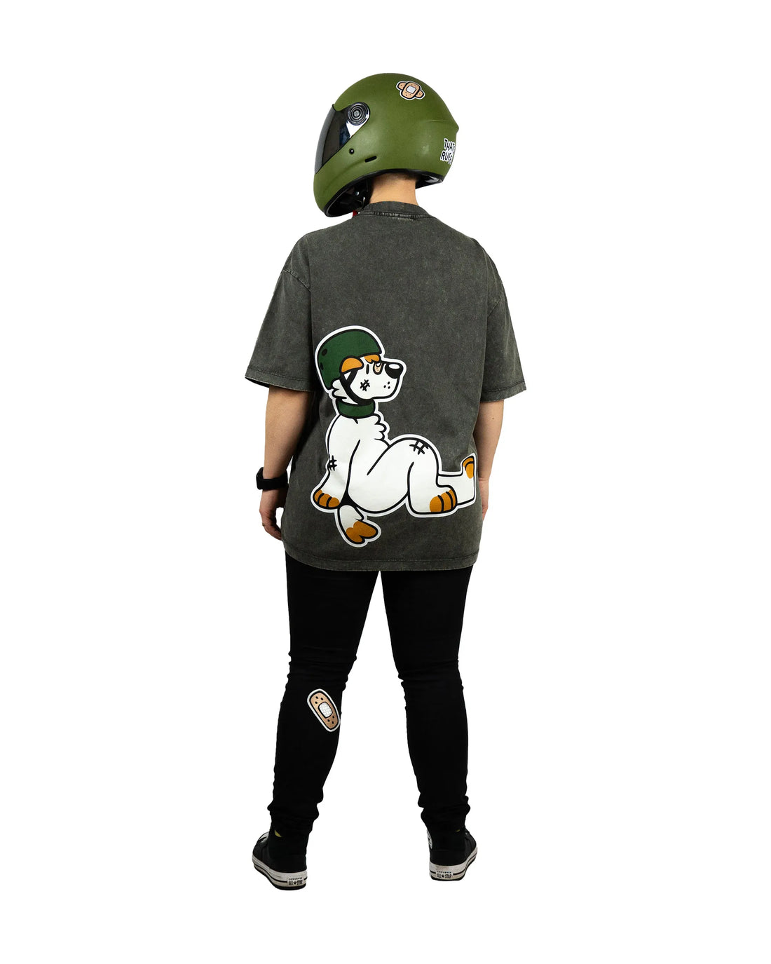 Perfect for furry enthusiasts and fans of playful streetwear, this gray t-shirt from That's Ruff! features a bold graphic of an anthropomorphic dog rocking a helmet. Tailored for comfort and style, it's paired with black pants accented by That's Ruff! patches for a complete look. Whether you're part of the furry fandom or just love standout designs, this shirt delivers rugged charm and individuality. Add a touch of whimsy to your wardrobe today!