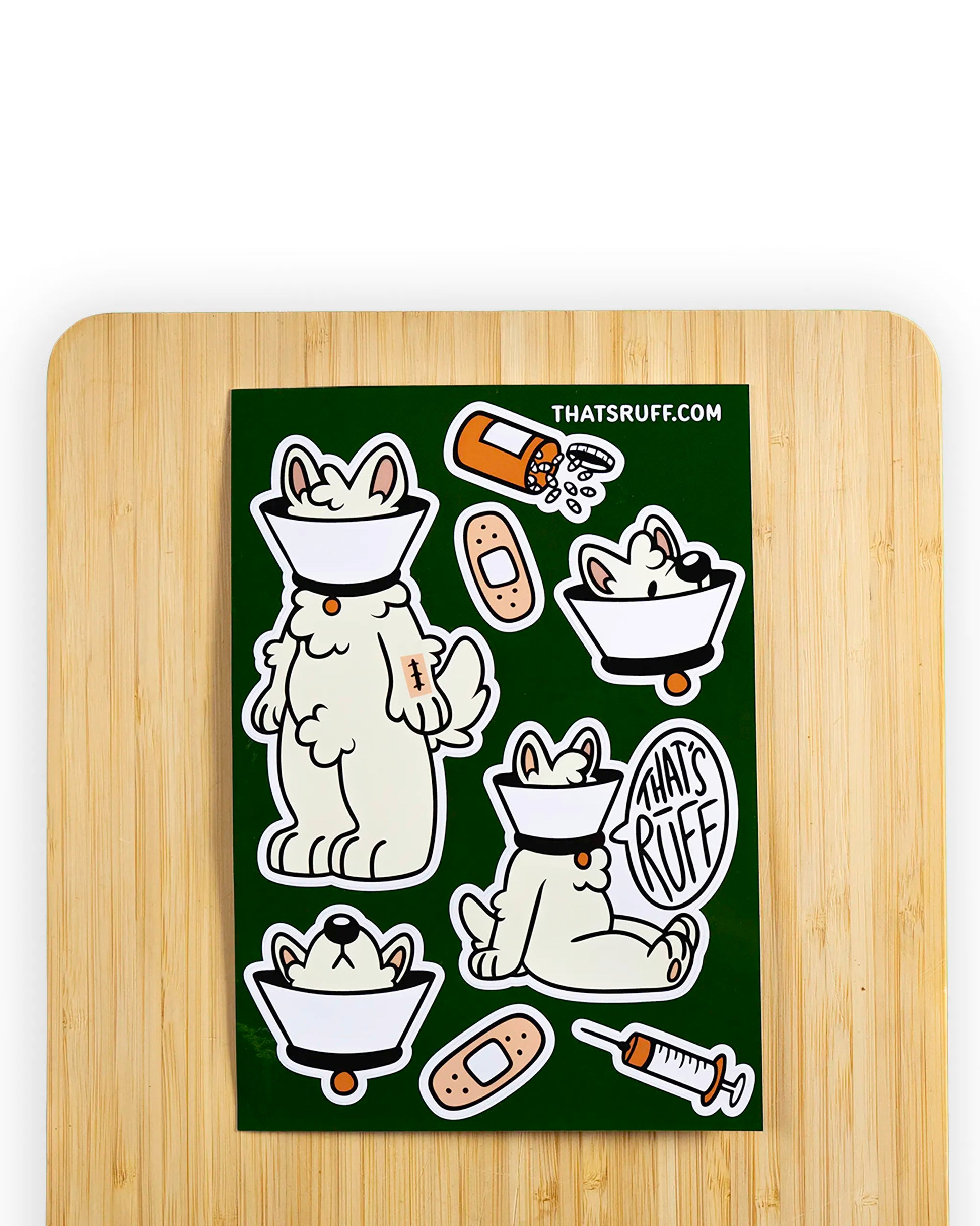 Green sticker sheet from the 'That's Ruff!' collection featuring a playful samoyed dog named Lamp wearing a cone of shame, bandages, and humorous medical-themed graphics. A fun and quirky design perfect for decorating laptops, journals, or water bottles with bold and creative flair.