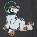 Close-up of the Ollie skater dog back print on an acid-wash grey oversized tee—cute animal furry merch.