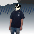 Model wearing dark navy true-to-size 300gsm pocket tee with embroidered tabby cat—furry merch and cute animal clothing.