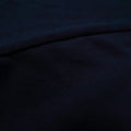 Fabric detail of dark navy 300gsm heavyweight 100% cotton from a pocket tee—durable streetwear.