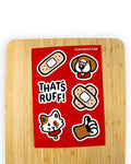 Bright red sticker sheet from the 'That's Ruff!' collection featuring playful cartoon designs, including a bandaged dog, cat, thumbs-up paw, and bandage graphics. Perfect for adding bold and expressive style to your laptop, water bottle, or personal accessories.
